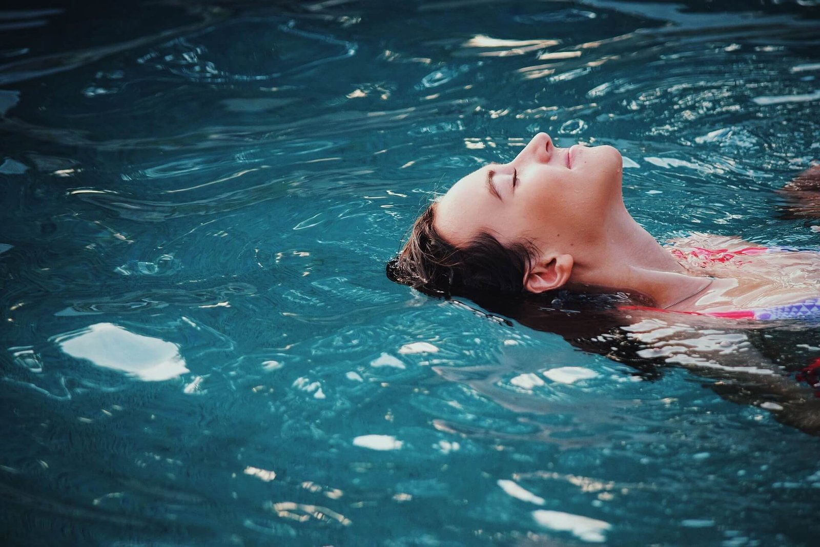 Swimmer in pool highlights that you could be swimming too.